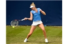 BIRMINGHAM, ENGLAND - JUNE 10:  Naomi Broady of Great Britain in action during her first round match against Barbora Zahlavova Strycova of the Czech Republic on day two of the Aegon Classic at Edgbaston Priory Club on June 10, 2014 in Birmingham, England.  (Photo by Tom Dulat/Getty Images)